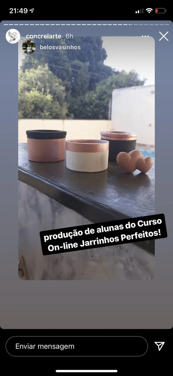 Foto de vasos de cimento com suculentas feitos por aluna